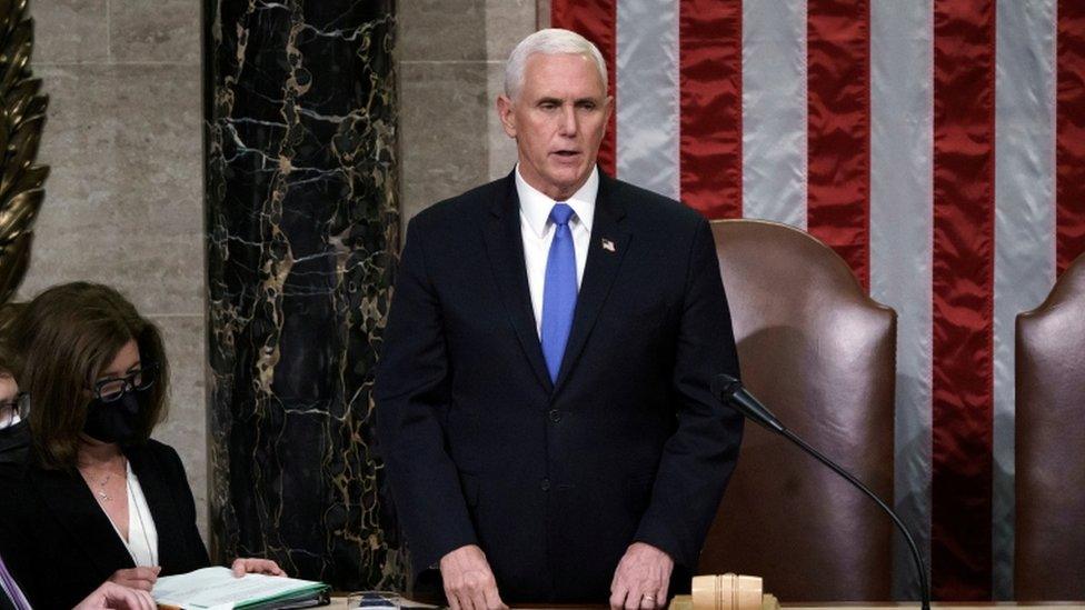 U.S. Vice President Mike Pence reads the final certification of Electoral College votes cast in November"s presidential election .