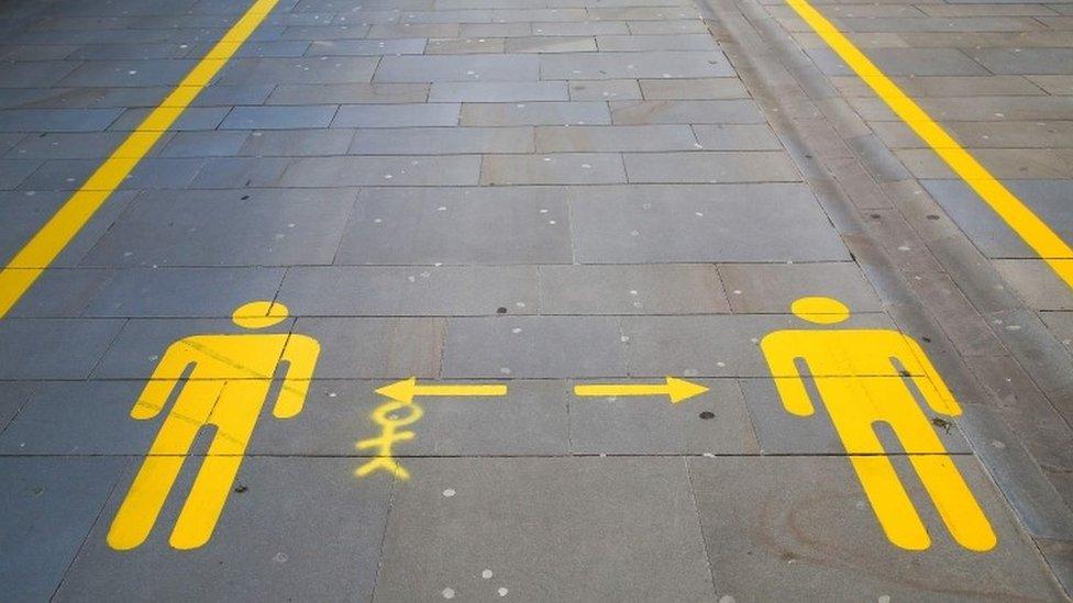 A pavement marking the way in Cardiff city centre