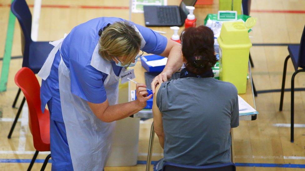 Vaccine being administered at a centre in Cwmbran