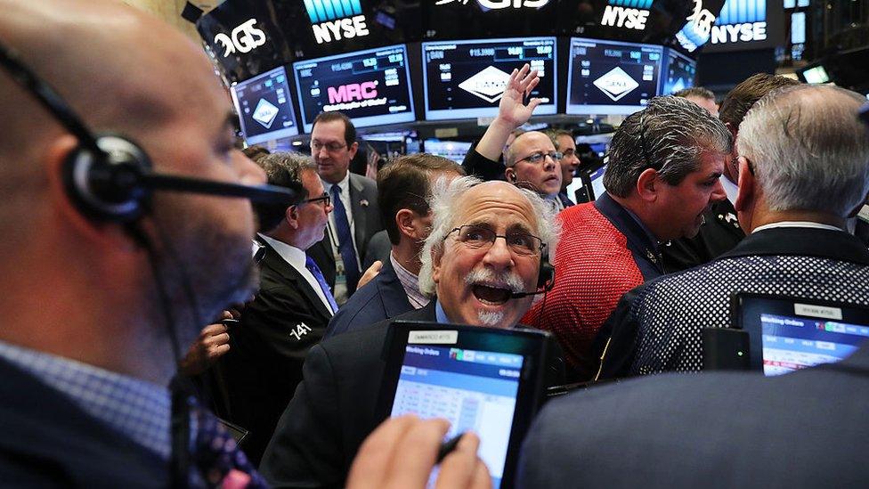 Traders on the floor of the New York Stock Exchange the morning after Donald Trump won the presidential election on 9 Nov, 2016