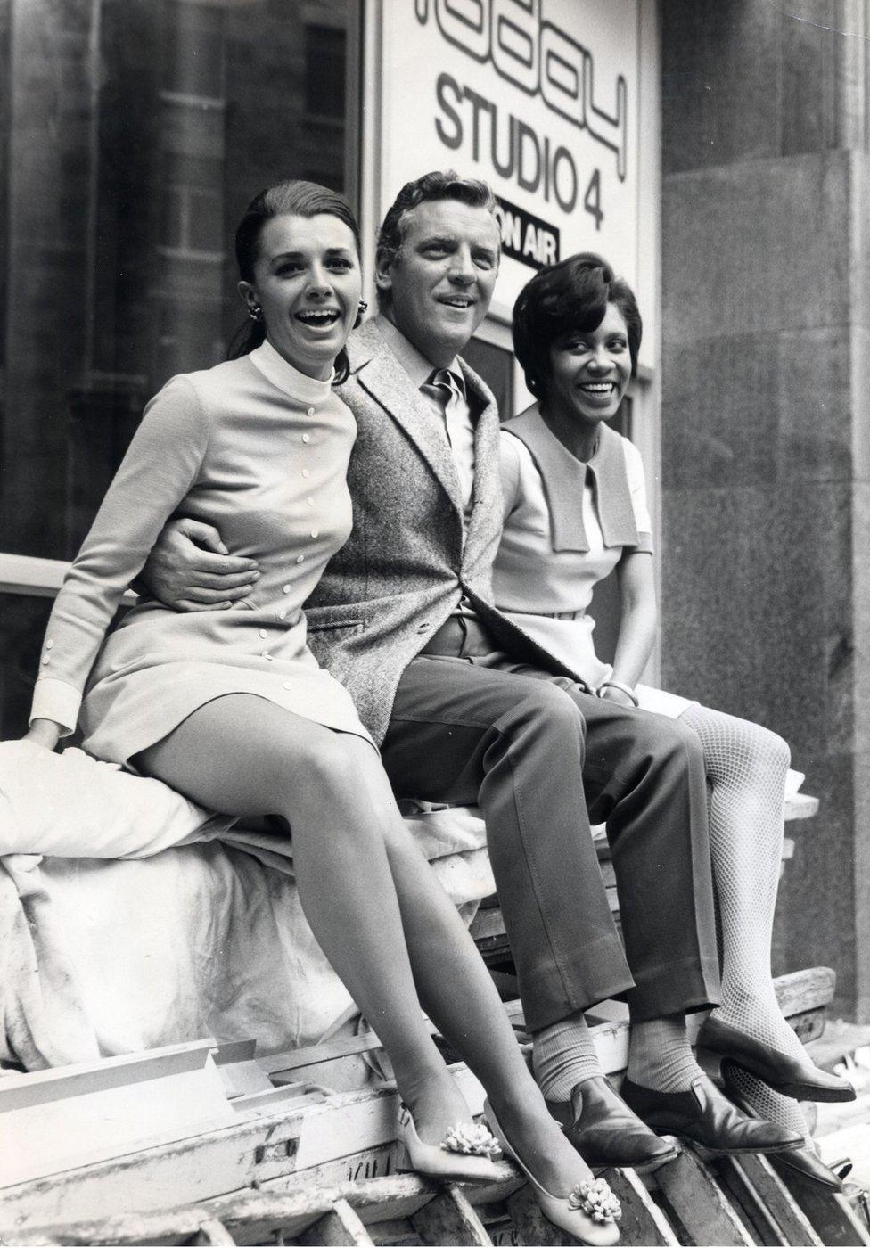 Barbara Blake Hannah (right) with Eamonn Andrews and fellow reporter Jane Probyn