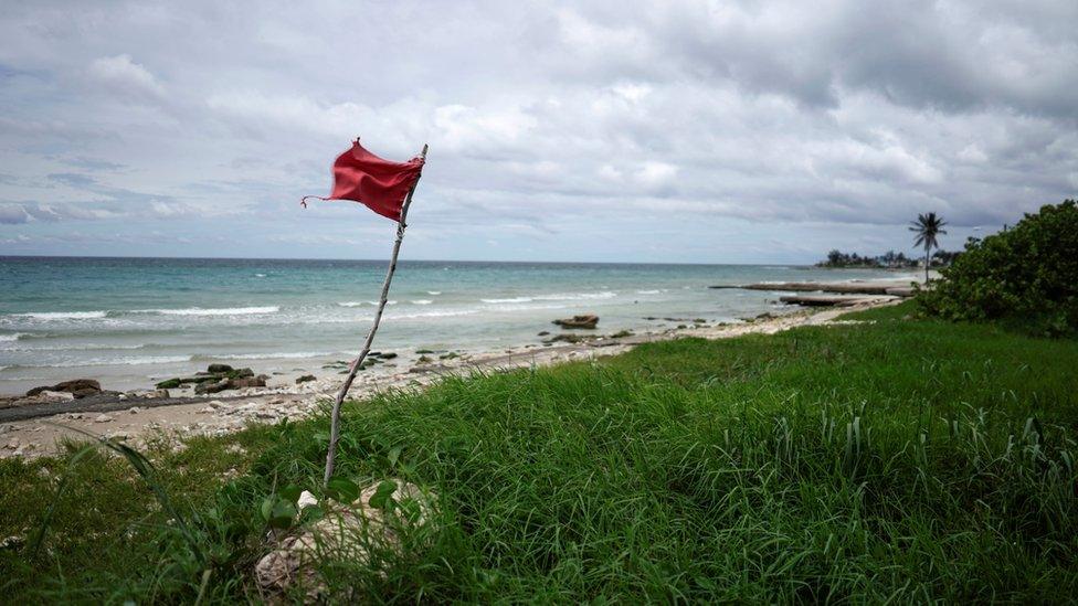 A red flag on the beach in Guanabo, Cuba