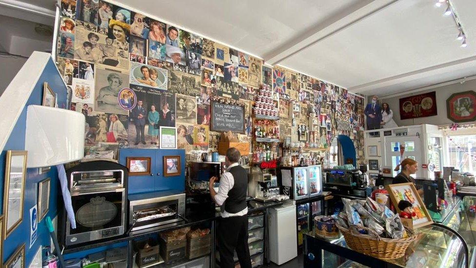 Cafe wall with images of Royal Family