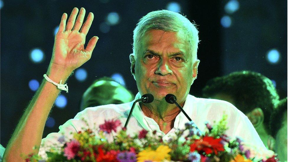 (file photo) United National Party (UNP) party leader Ranil Wickremesinghe waves to supporters during the party's final campaign rally ahead of the upcoming parliamentary elections in Colombo on August 2, 2020.