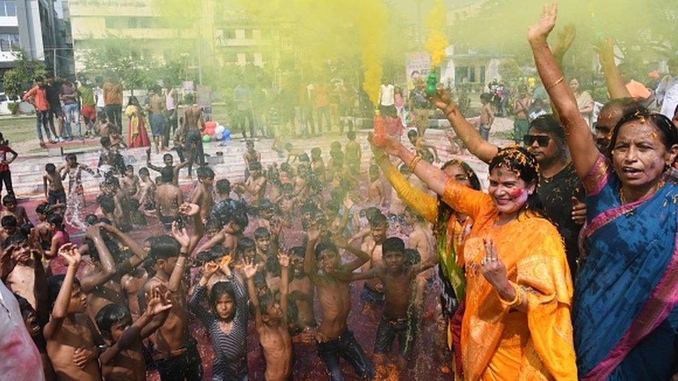 Children playing Holi during Chapak Holi Milan Samaroh at Hanuman Nagar Park on March 17, 2022 in Patna, India