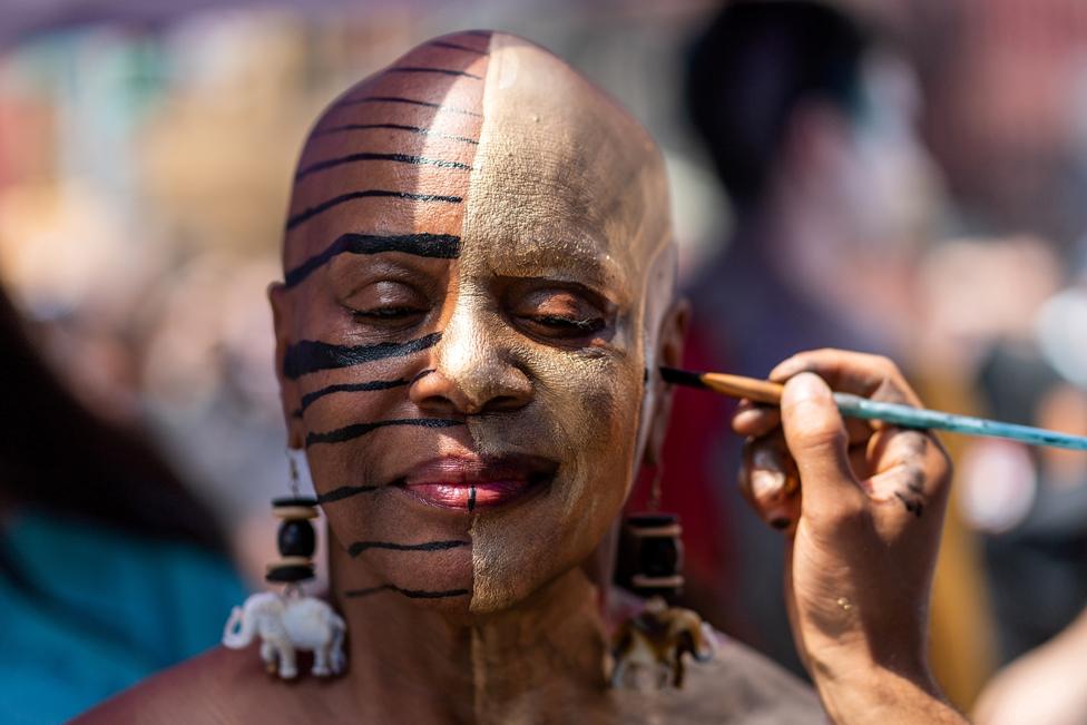 Theresa Snipe is painted during the annual NYC Bodypainting Day at Union Square in New York City, USA, 25 July 2021.