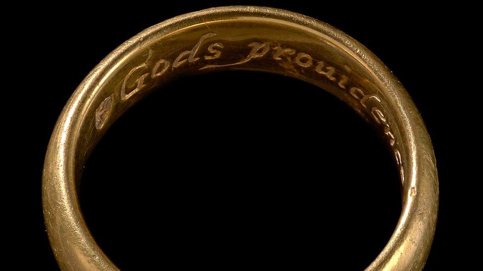 Gold ring with an inscription inside