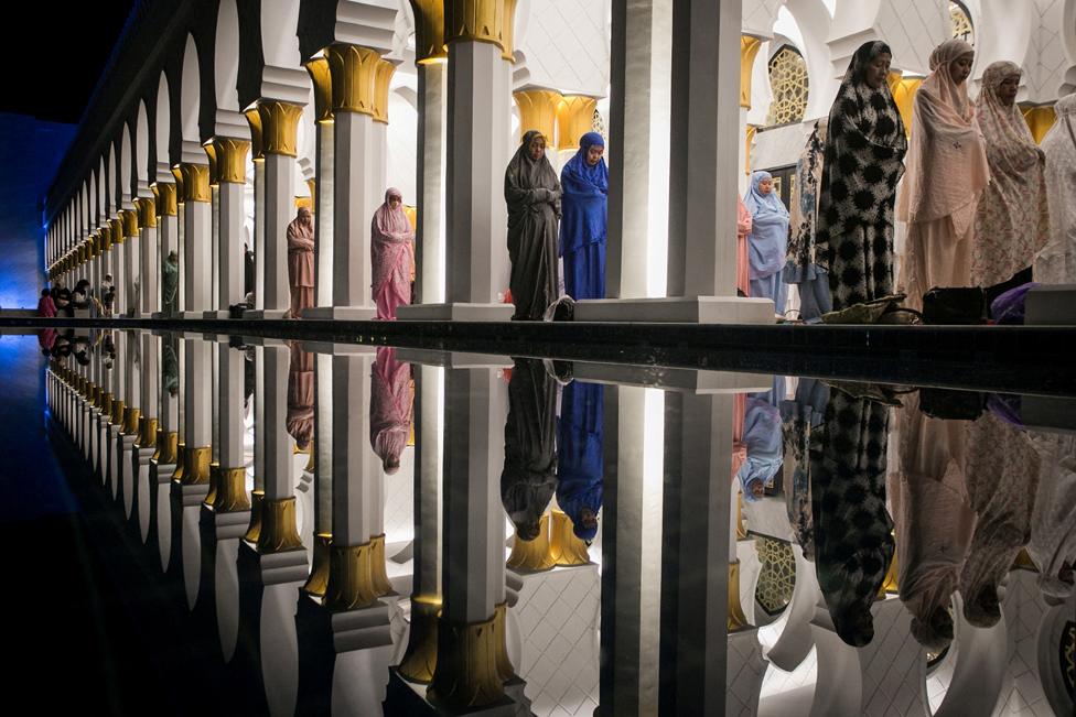 Muslim women offer 'Tarawih' mass prayers during the first evening of the holy fasting month of Ramadan at Sheikh Zayed Grand mosque in Solo, Central Java province, Indonesia, March 22, 2023