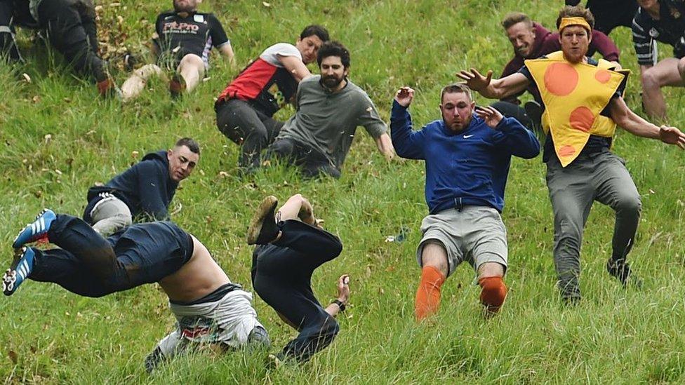 Cheese rolling on Cooper's Hill at Brockworth, Gloucestershire