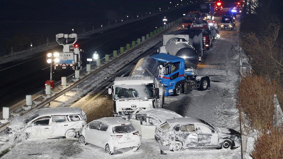 Rescue workers at the scene of the crash