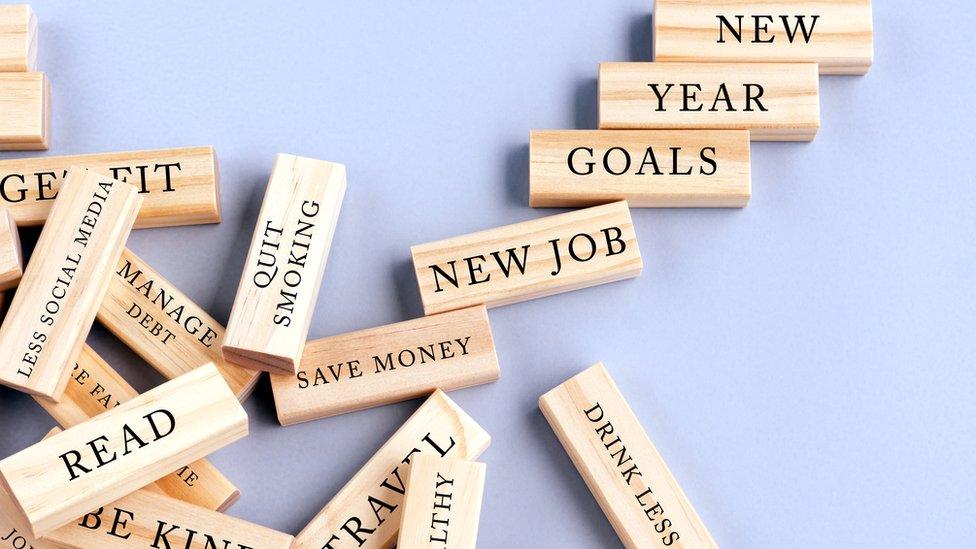 New Year resolutions written on wooden blocks