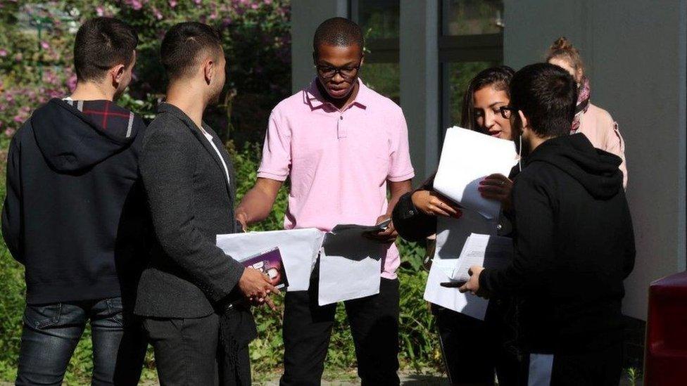 Students at Ark Academy in Wembley, north London, discuss their results