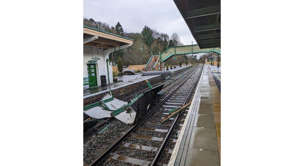 Okehampton station with debris visible across the tracks