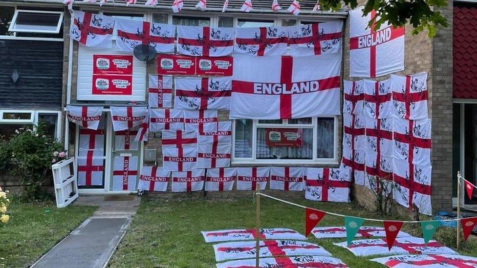 Johnson house covered in England flags