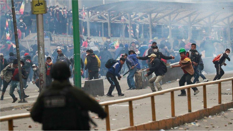 Security forces and supporters of former Bolivian President Evo Morales clash in La Paz, Bolivia, 14 November, 2019.