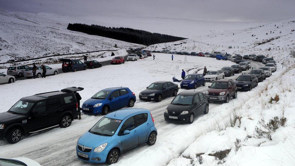 Cars parked on the A470 near Storey Arms