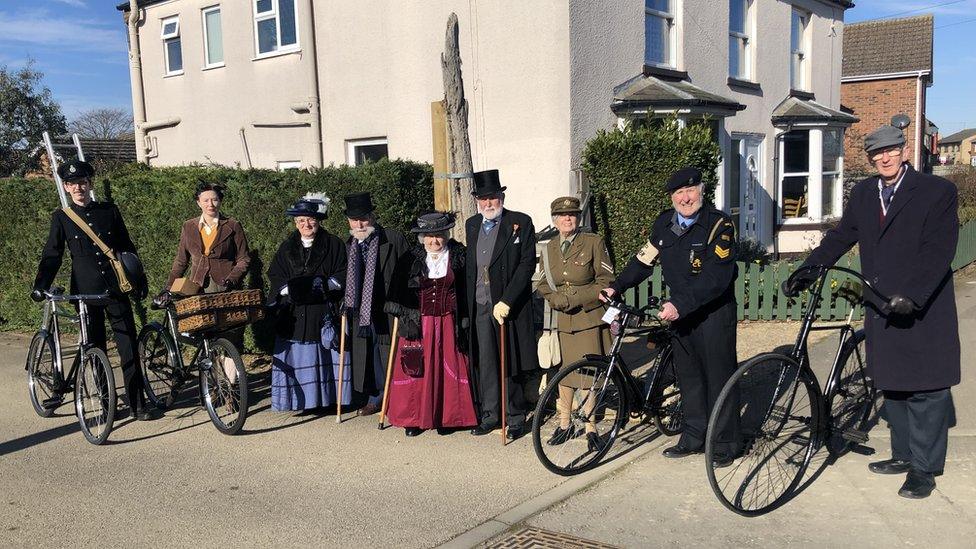 Members of March veteran and vintage cycle club turned out to see a whale bone being installed in vintage clothing