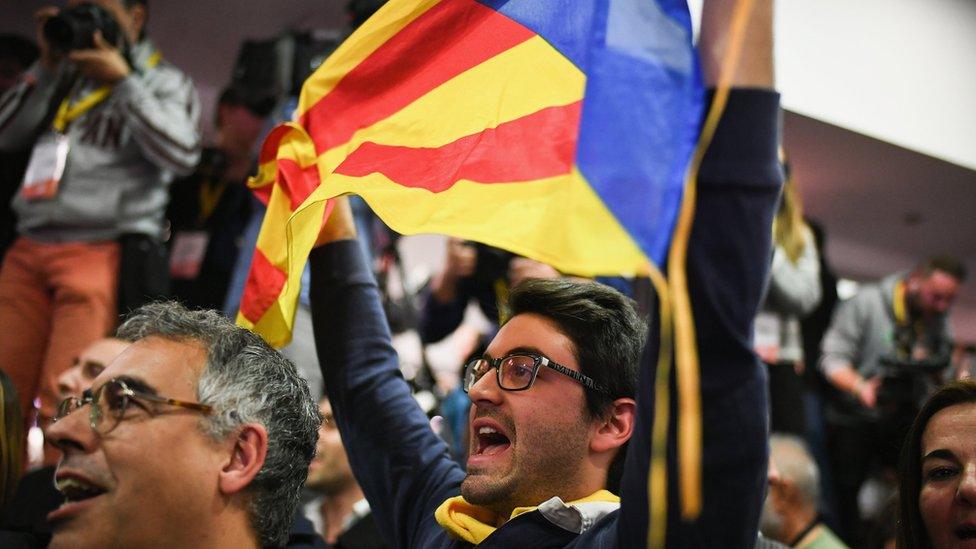 Junts Per Catalunya supporters celebrate following the Catalan regional election in on December 21, 2017 in Barcelona, Spain