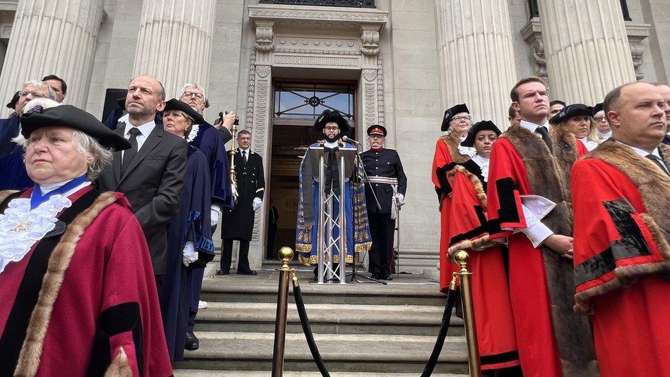 Councillor Taouzzale reads out the proclamation on the steps of Old Marylebone Town Hall