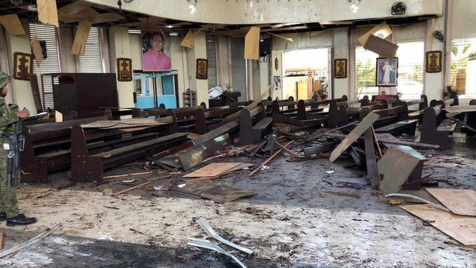 Debris inside a Catholic church in Jolo after twin bomb blasts. Photo: 27 January 2019