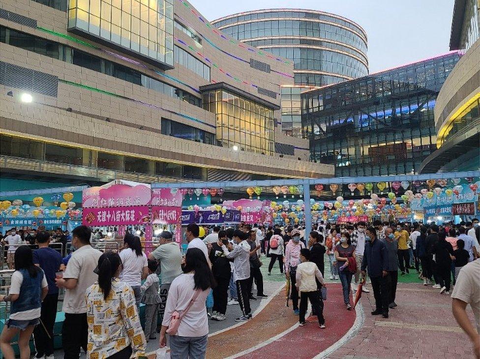 Celebrations in front of shopping mall in China