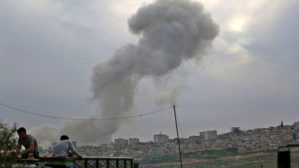 Smoke rises from the Syrian city of Afrin following an explosion on 18 March 2018