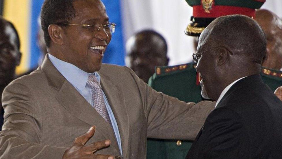 Tanzania's outgoing President Jakaya Kikwete (L) embraces President-elect John Magufuli during an official ceremony to announce Magufuli's victory after presidential elections in Dar es Salaam October 30, 2015