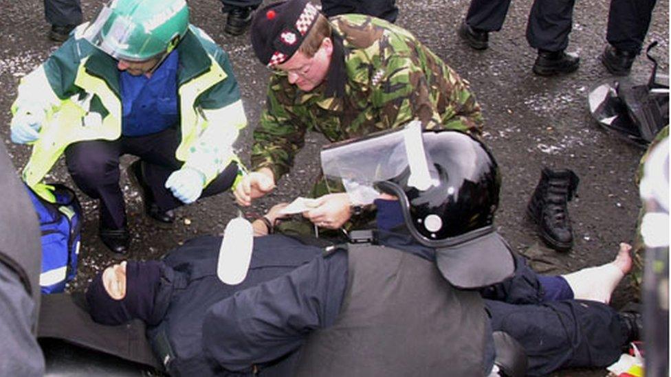 A police officer was injured during the protests when loyalist threw a blast bomb on 5 September 2001