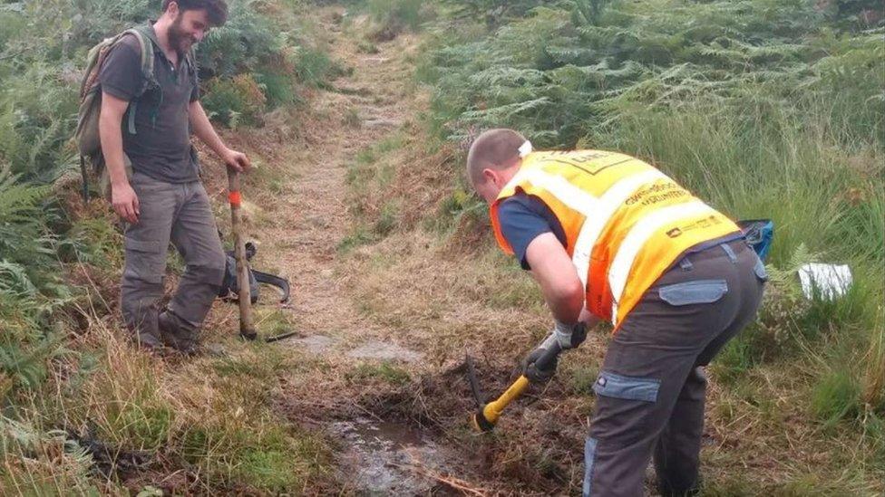 Footpath being repaired