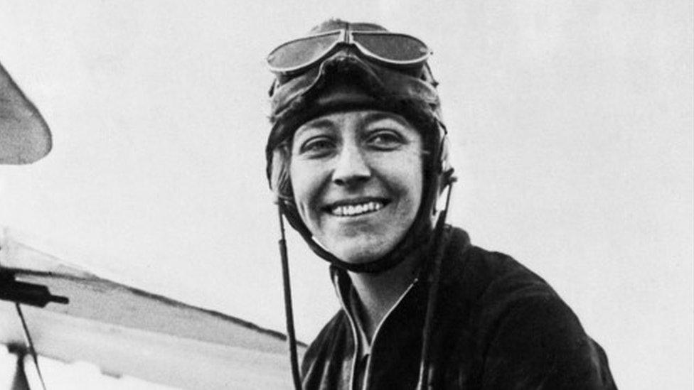 British aviator Amy Johnson in the cockpit of her Gipsy Moth plane before her historic solo flight from Britain to Australia in 1930.