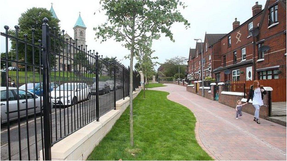 railings lined with trees