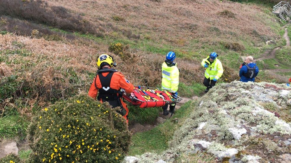 Rescue workers with stretcher