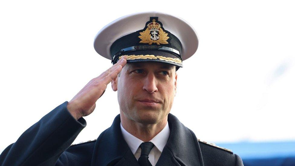 Prince William saluting the new officers