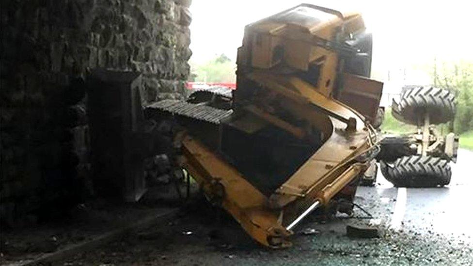 Digger and tractor strike Crossgates bridge in Powys