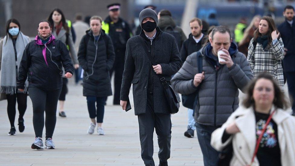 File image of workers crossing London Bridge during the morning rush hour on 21 March