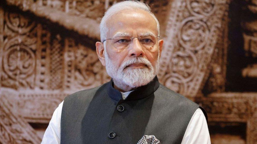 India's Prime Minister Narendra Modi waits to welcome leaders of the G20 countries at the Bharat Mandapam in New Delhi on September 9, 2023. (Photo by Ludovic MARIN / POOL / AFP) (Photo by LUDOVIC MARIN/POOL/AFP via Getty Images)