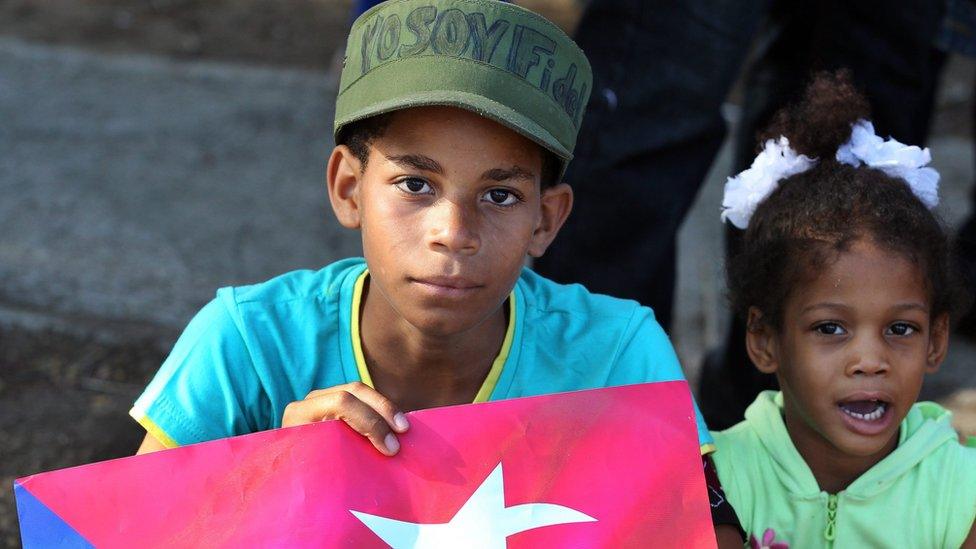 Cubans children wait to see the tomb of late Cuban leader Fidel Castro next to the entrance of the Santa Ifigenia cemetery in Santiago de Cuba, Cuba, 04 December 2016