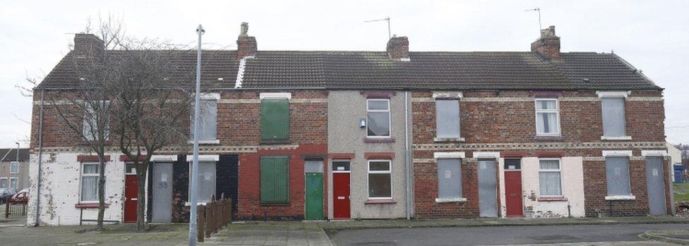 Homes with doors painted red