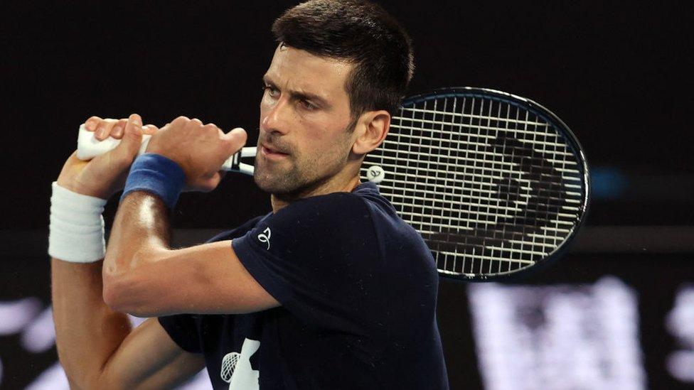 Novak Djokovic of Serbia attends a practice session ahead of the Australian Open tennis tournament in Melbourne on January 14, 2022.