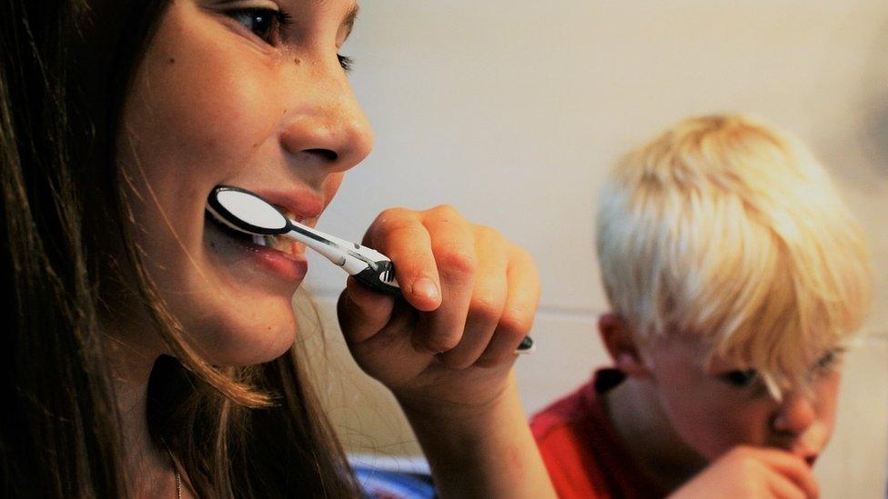 Children brushing their teeth