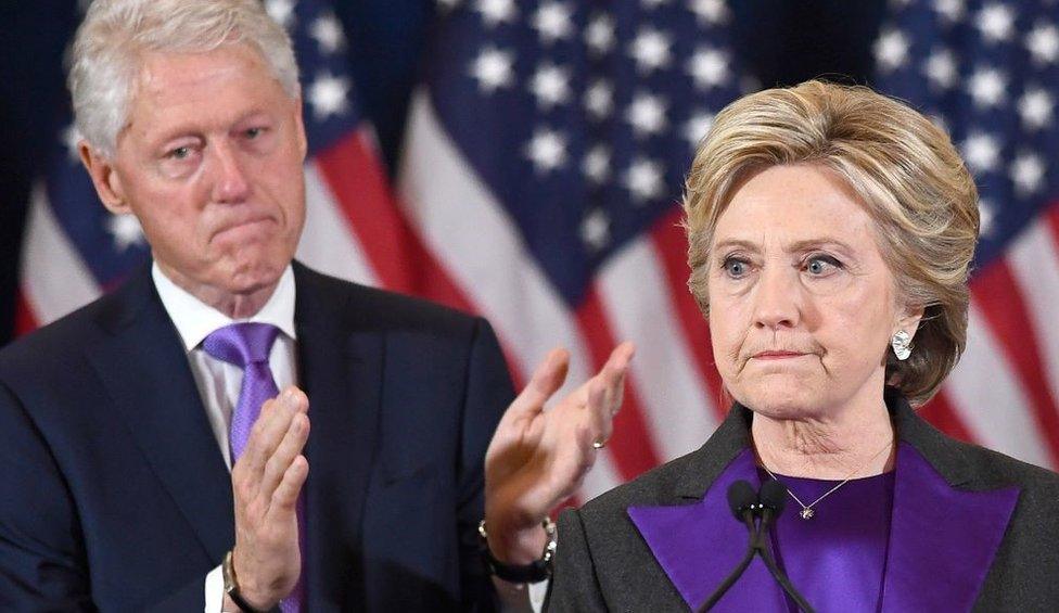 US Democratic presidential candidate Hillary Clinton makes a concession speech after being defeated by Republican President-elect Donald Trump, as former President Bill Clinton looks on in New York on November 9, 2016