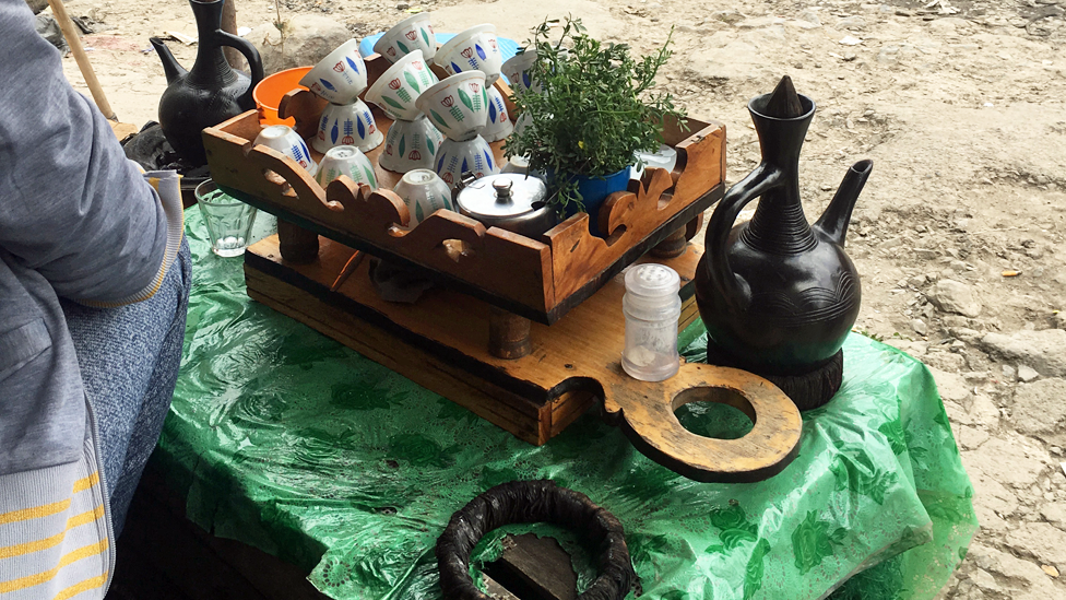 A table outside a cafe with coffee cups in Bole-Mikael in Addis Ababa, Somalia