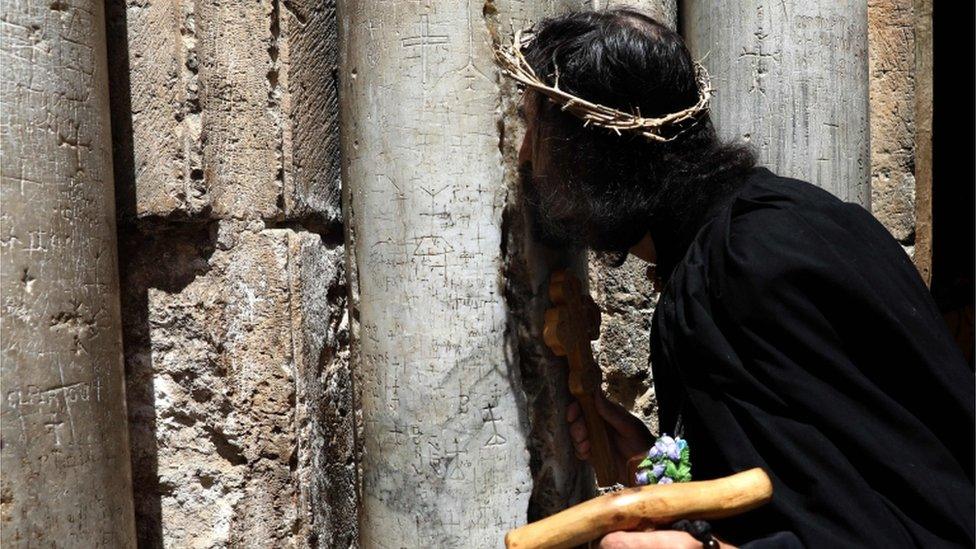 A Russian pilgrim wearing a crown of thorns in Jerusalem ahead of Orthodox Easter