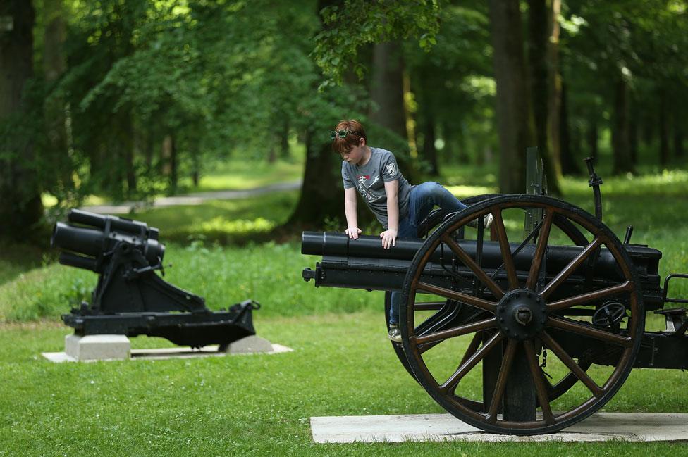 Boy climbs on cannon on 100th anniversary at Belleau Wood