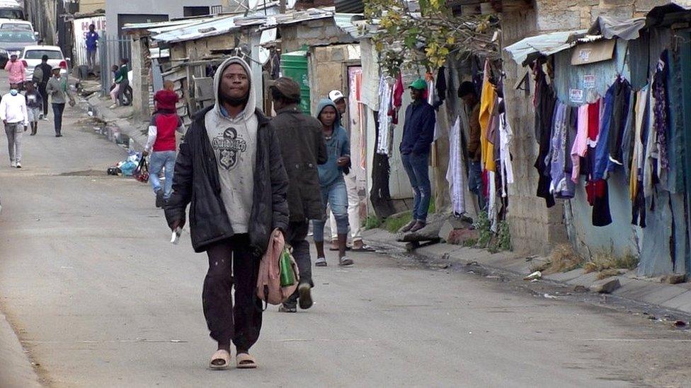 Man walking through the township