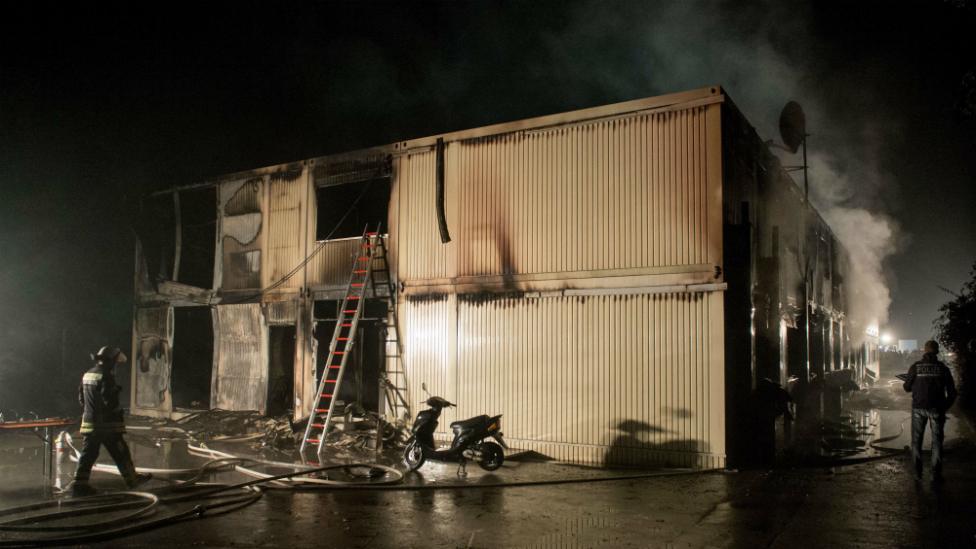 Firemen stand by temporary accommodation for refugees in Rottenburg am Neckar, Germany - 7 September 2015