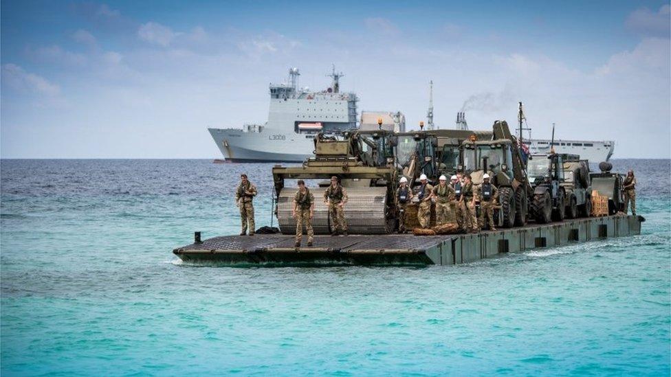 A Mexifloat from RFA Mounts Bay on its way to Grand Turk in the Turks and Caicos islands with vehicles for use in the rebuild