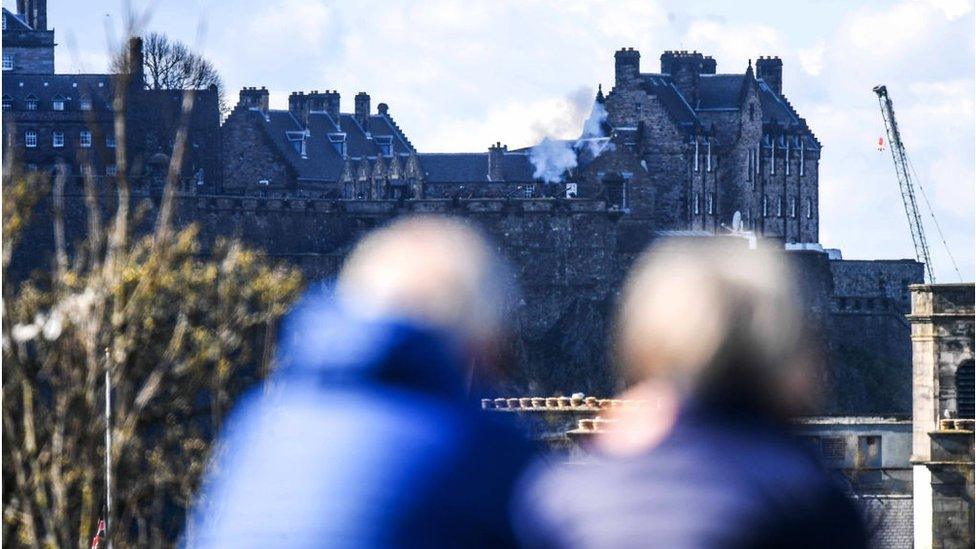 people watching Edinburgh Castle gun salute