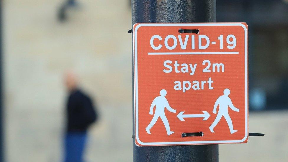 A "stay 2m apart" sign in Manchester