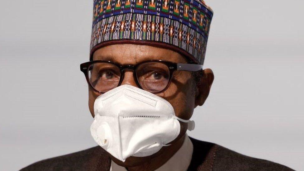 Nigeria's President Muhammadu Buhari poses before the opening session of the Summit on the Financing of African Economies on May 18, 2021 in Paris